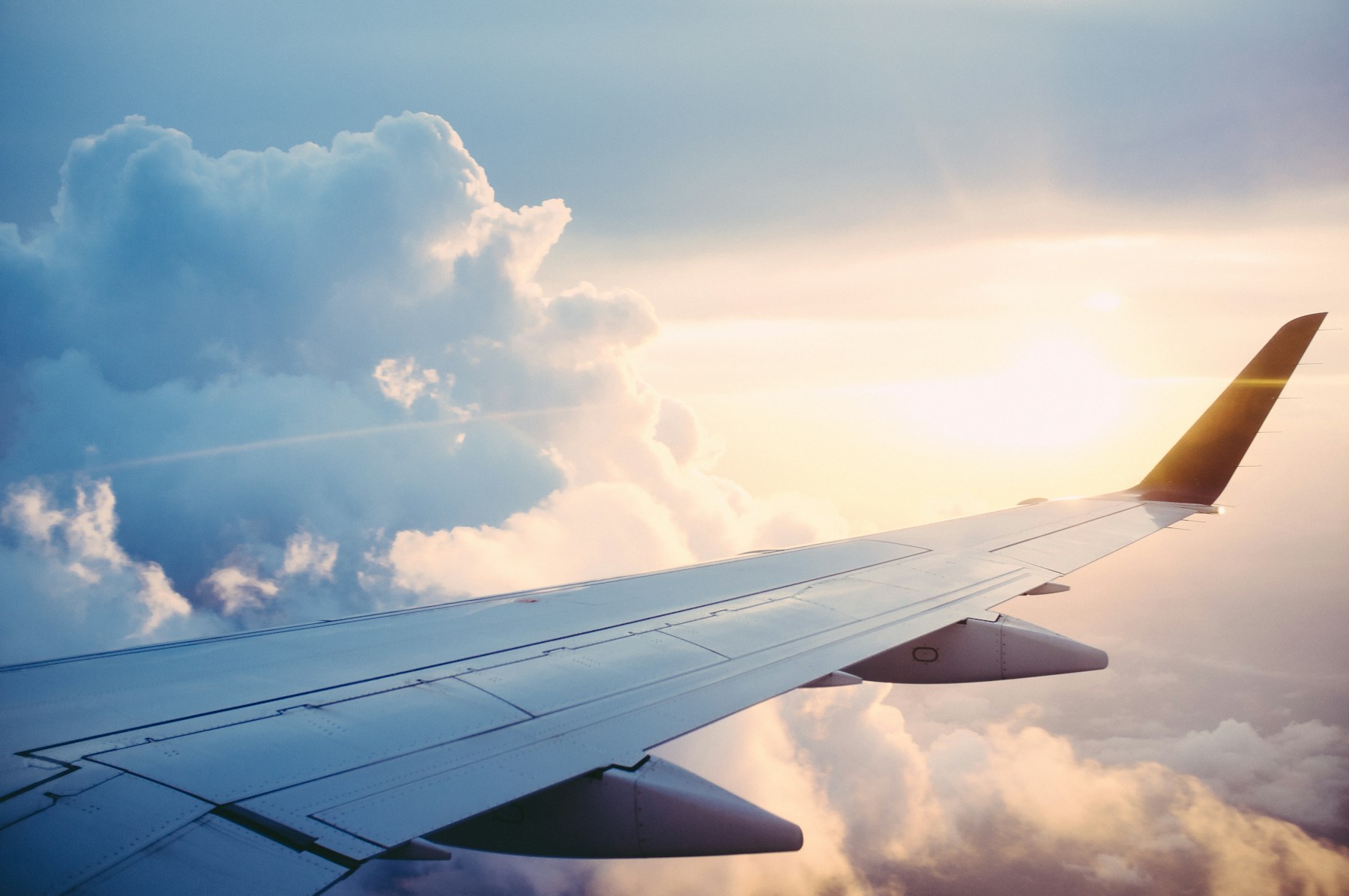 Passenger aircraft flying above the clouds